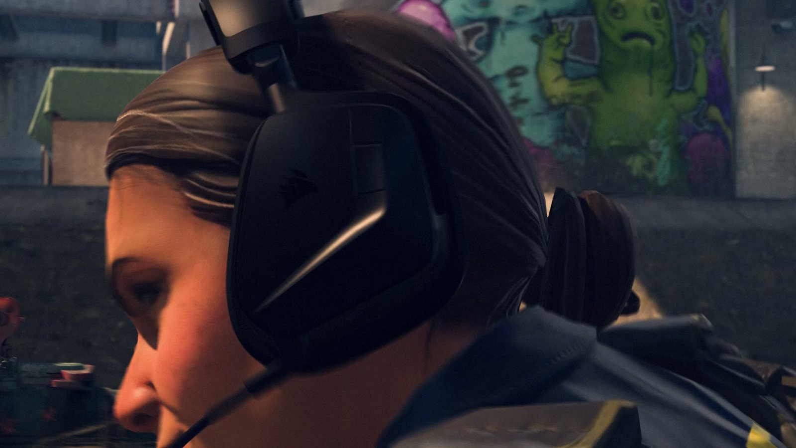 Close-up of a Counter-Strike 2 character wearing a black Corsair headset, the sail logo visible on the earcup